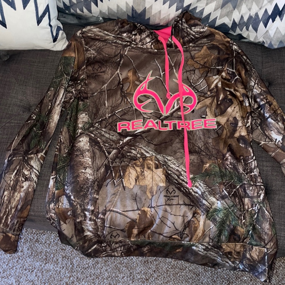 Brand new camo size large but fits me as a medium would.